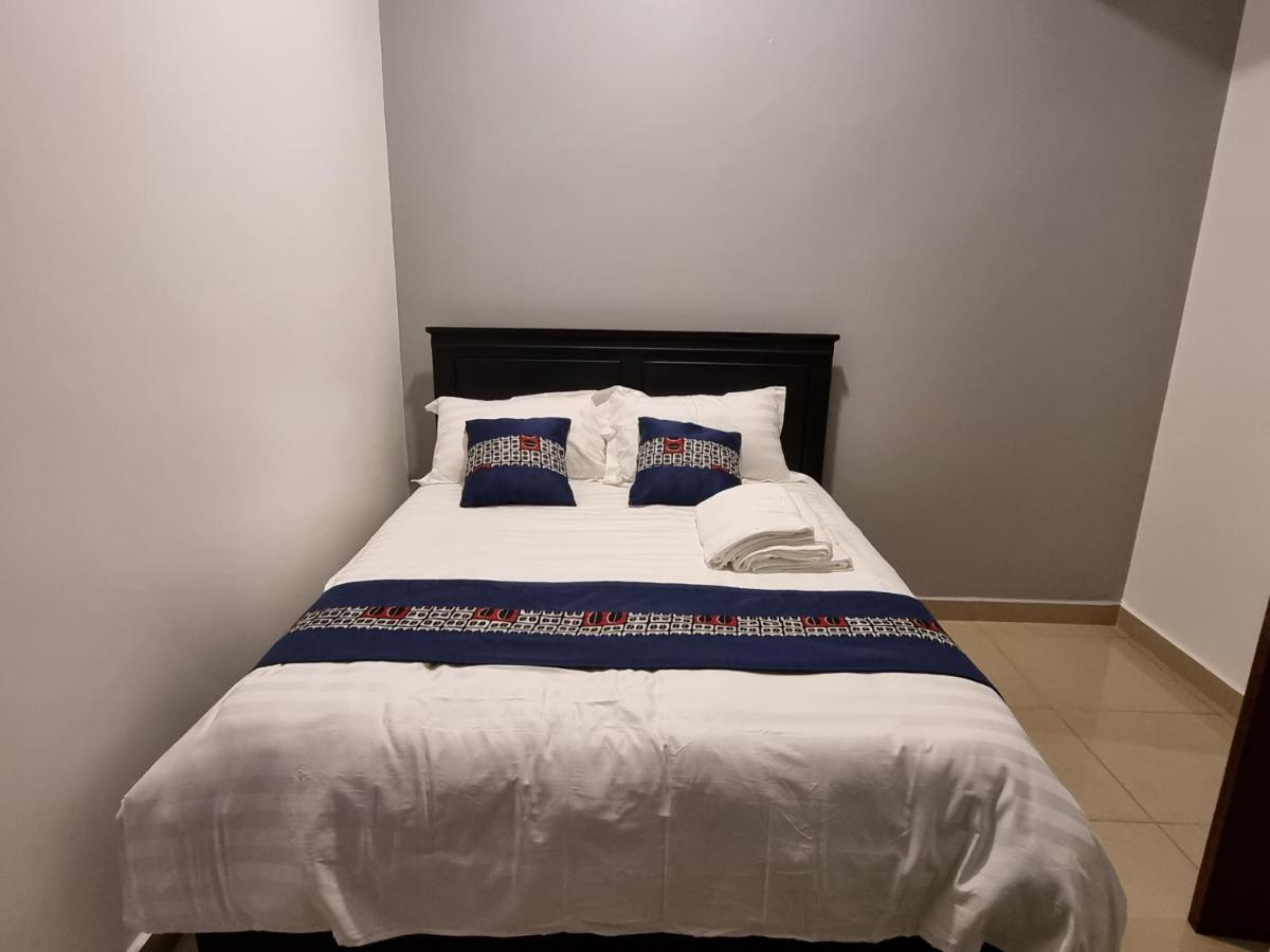 Eika Suites At Acacia Кампала Екстер'єр фото